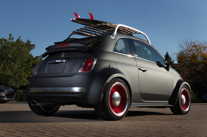 Fiat 500 Beach Cruiser and its matching surfboard
