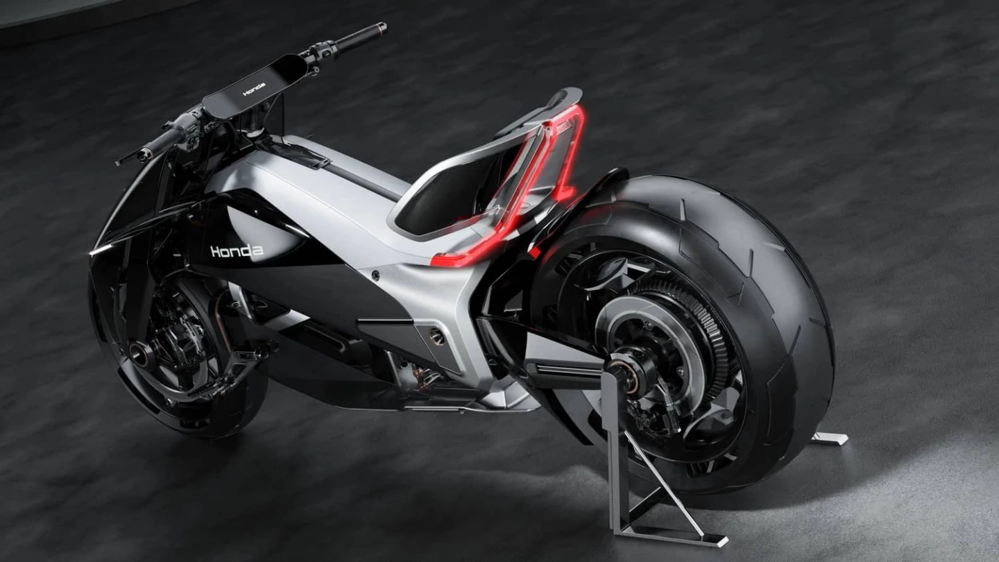 The concept is based around an aluminum chassis and a rear swingarm. The battery pack is centrally positioned and hangs low within that aluminum frame.