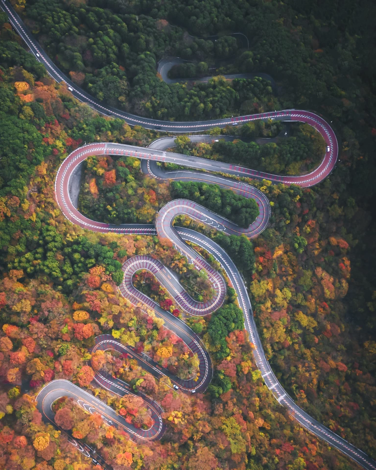 This is an aerial photograph of a mountain road in Hakone, Japan