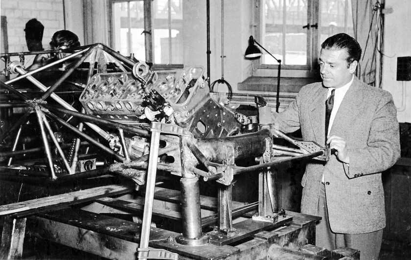 Mercedes designer Rudolf Uhlenhaut seen with the 1955 300 SLR displaying the same laid-down straight motor (in this case a six-cylinder) and low frontal area Uhlenhaut employed in the W 196 R