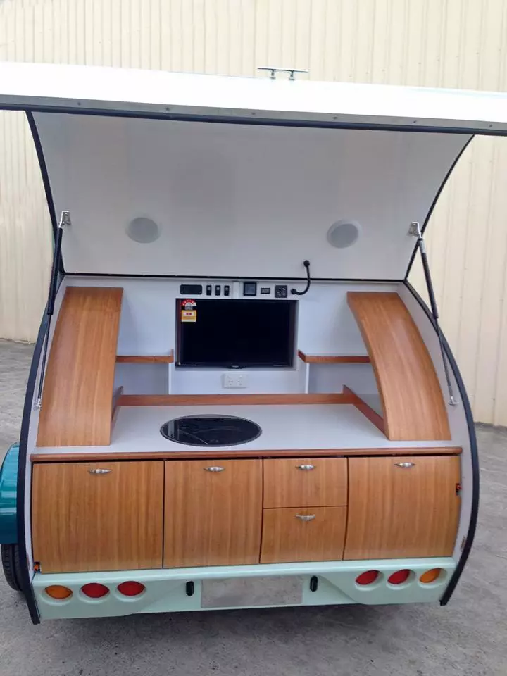 Gidget's rotating entertainment center allows you to watch TV inside and out