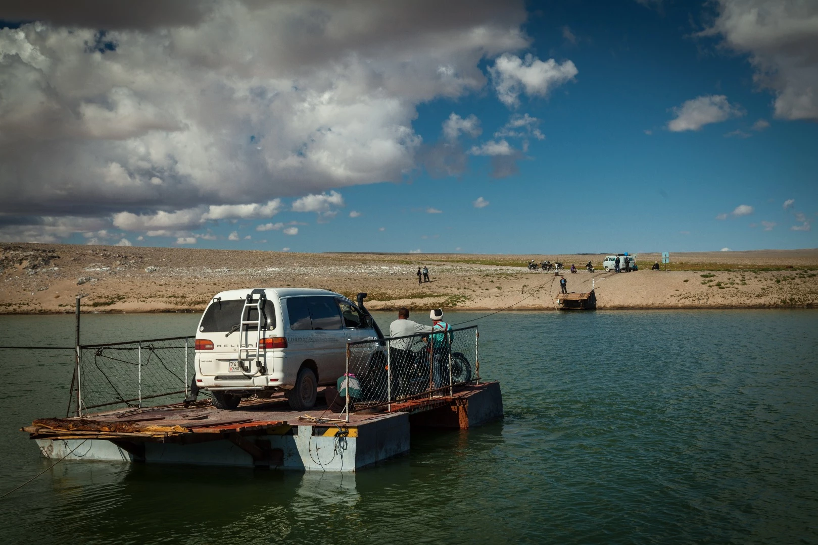 Crossing lake Hyargas nuur by hand-pulled ferry