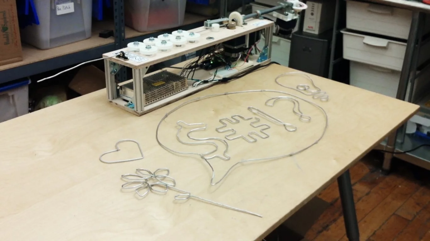 A New York design consultancy has built the DIWire Bender machine, which can bend and shape strips of wire into elaborate designs based on simple line drawings