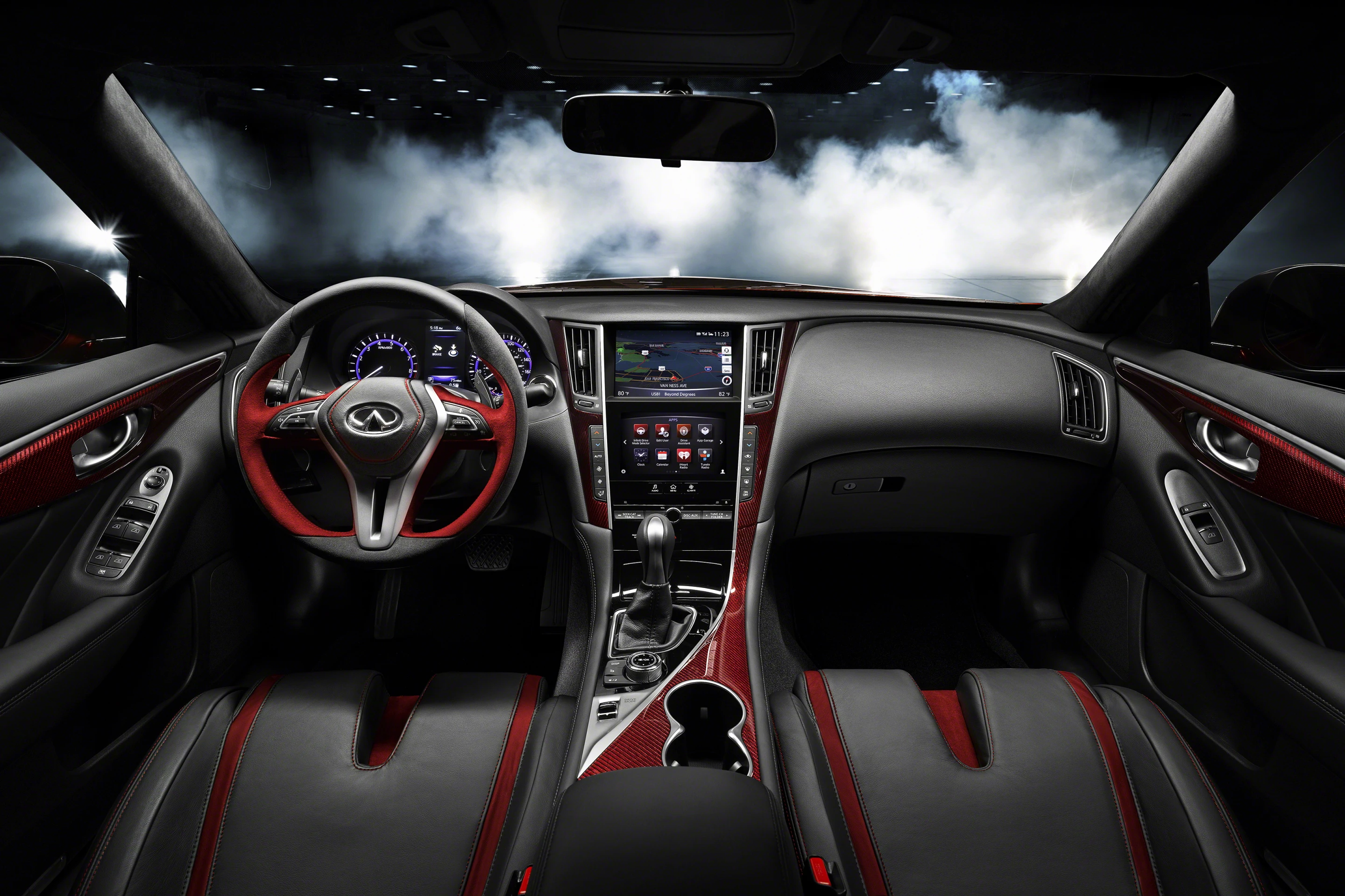 A high-grip sports steering wheel next to F1 style paddle-shifters helps deliver the car’s overall performance message