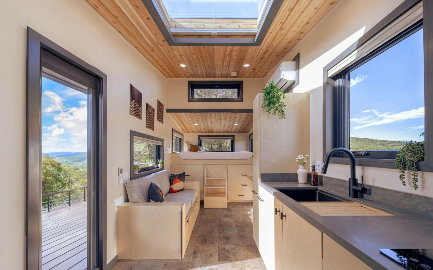 The Minuet's interior decor is made up of stone floors, drywall walls, and a wooden ceiling