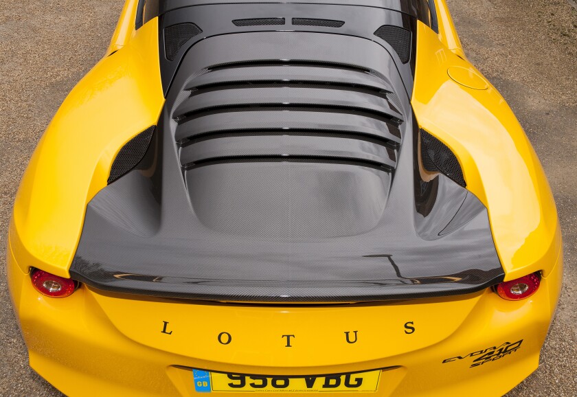 The Evora Sport 410 has a carbon fiber tailgate with integrated rear spoiler and louvered backlight