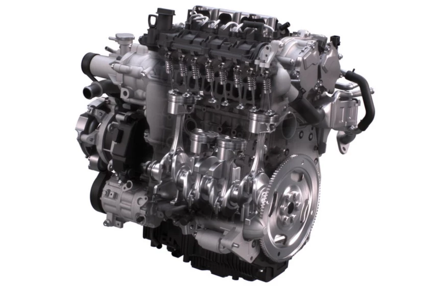 Cutaway of the Skyactiv-X engine showing the dual ports and valves in the inline-four design