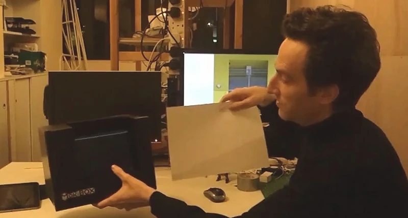MakiBox designer Jon Buford shows off the 3D printer's compact size