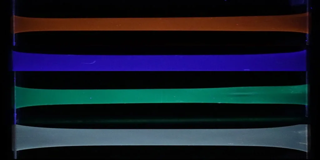 By altering the type of macrocycles used, the polymer can be made to fluoresce blue, green or orange – a white glow can also be produced, by combining them