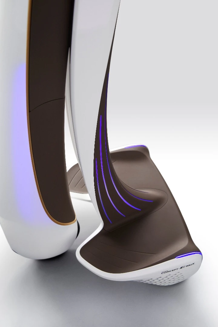 Toyota's Concept i Walk is a three-wheeled vehicle with a low-floor for easier hopping on and off