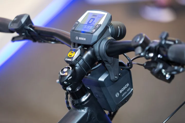 The Bosch eBike ABS front brake activation module, visible beneath the handlebar stem