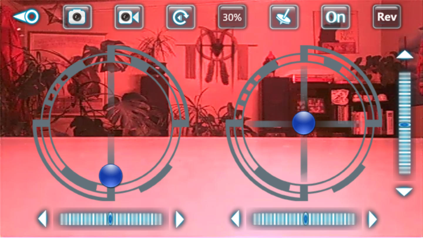 The Axis Drones mobile app provides flight controls on top of the camera feed. Low-light conditions skew colors.
