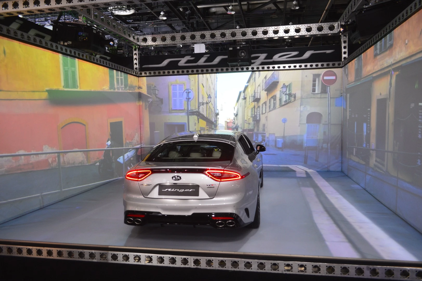 The Kia Stinger negotiates what looks like the tight streets of a European city center in this demonstrator
