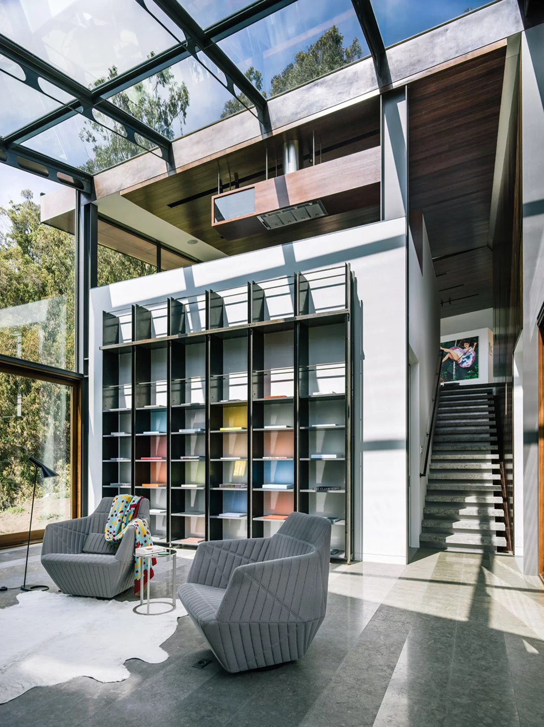 The house features a large glass library (Photo: Joe Fletcher Photography)