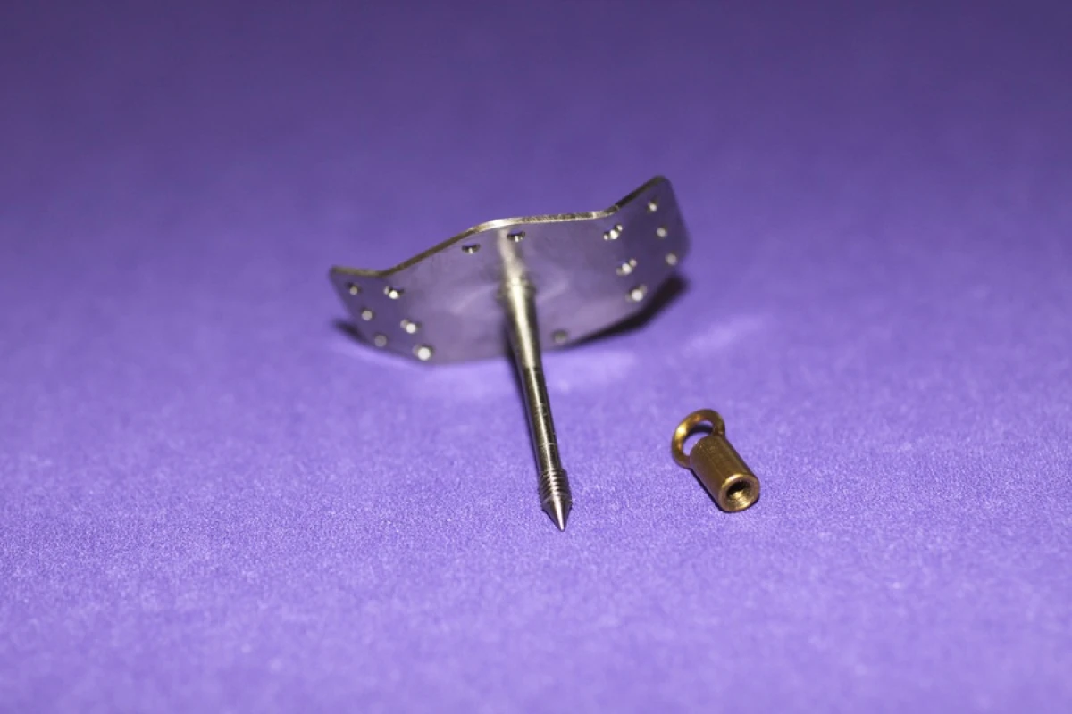The UC Davis device, which is pierced through a patient's throat, allowing them to swallow by using their hand