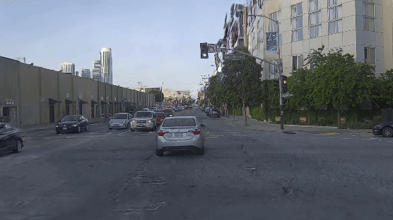 An example situation in a virtual world generated by Volvo's AI, which requires the car to swerve out to safety