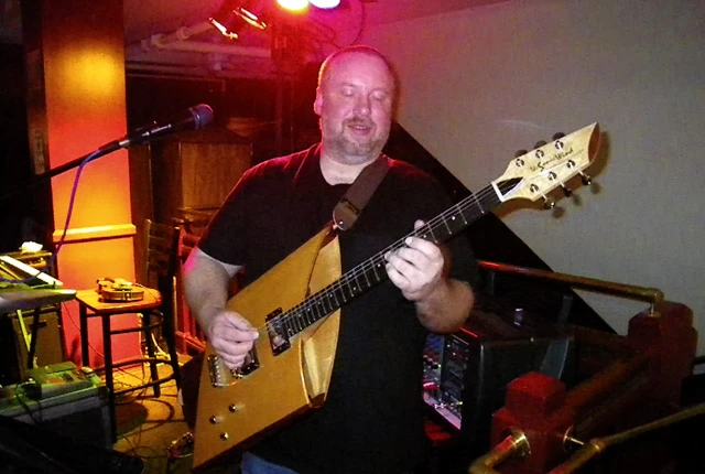 Guitar player Dave Cooper puts the Sonic Wind through its paces at a recent guitar show