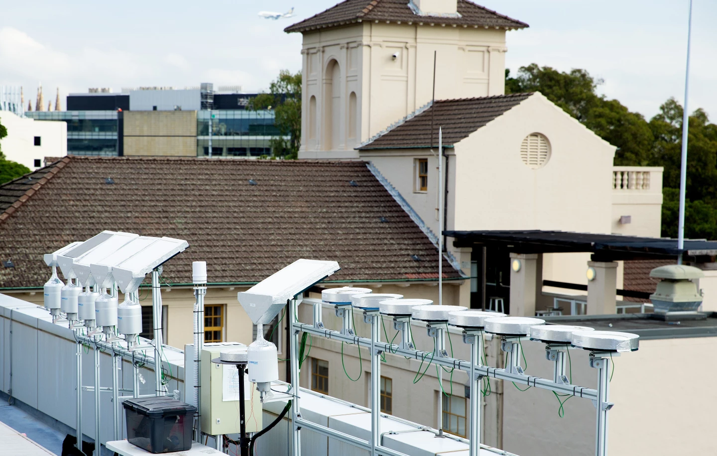 Painted tiles being tested on the roof of the Sydney Nanoscience Hub