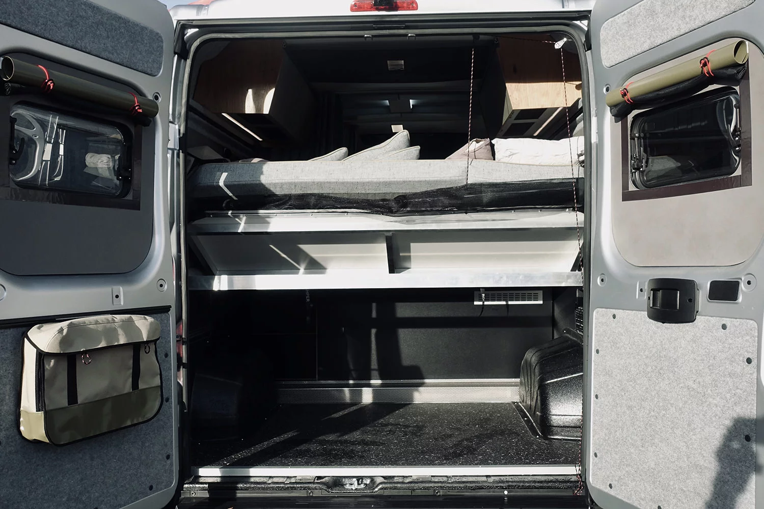 We're not sure it's necessary, but the pulley is there to lift the bed up to create more storage space