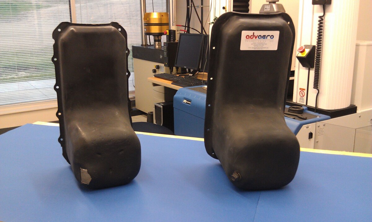 Advaero composite carbon fiber truck oil pan is half the weight of the metal one (left)
