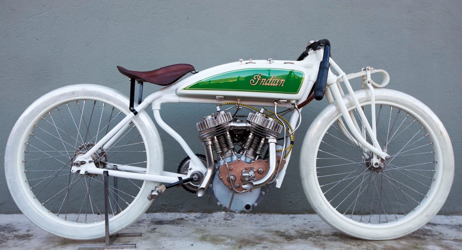 The photogenic Altoona was Indian’s hottest racing model of the 1920s. The Altoona Speedway was a 1.25-mile (2-km) board track located in central Pennsylvania which was the home of the American Board Track Championship races during the 1920s. Winning Altoona was so important that a winning machine might adopt the track name as its own, as was the case with many other bikes and cars which won at other famous venues such Daytona, Bonneville, TT and IOM, Le Mans ad infinitum. On July 9, 1926, "Curley" Fredericks lapped Altoona at an average speed of 114 mph (183 km/h) in a race, the highest speed ever recorded on a circular track, and the Indian racer was immediately dubbed the "Altoona."The record price for an Altoona was set at the E.J. Cole Collection auction, when a 1928 model fetched $247,500. At less than a third that price, fully-restored, this bike represents great value.