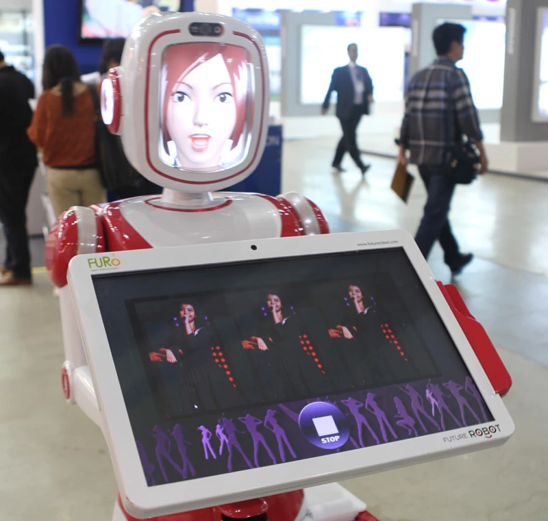 Future Robot's service robot FURO can perform a simple dance, looks sad when customers leave, and carries a touch screen that can function as a menu in restaurants.