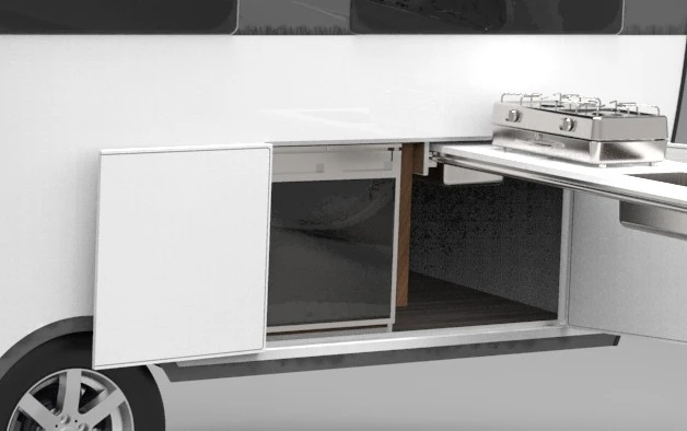 The sliding outdoor kitchen counter and external refrigerator access door support open-air cooking