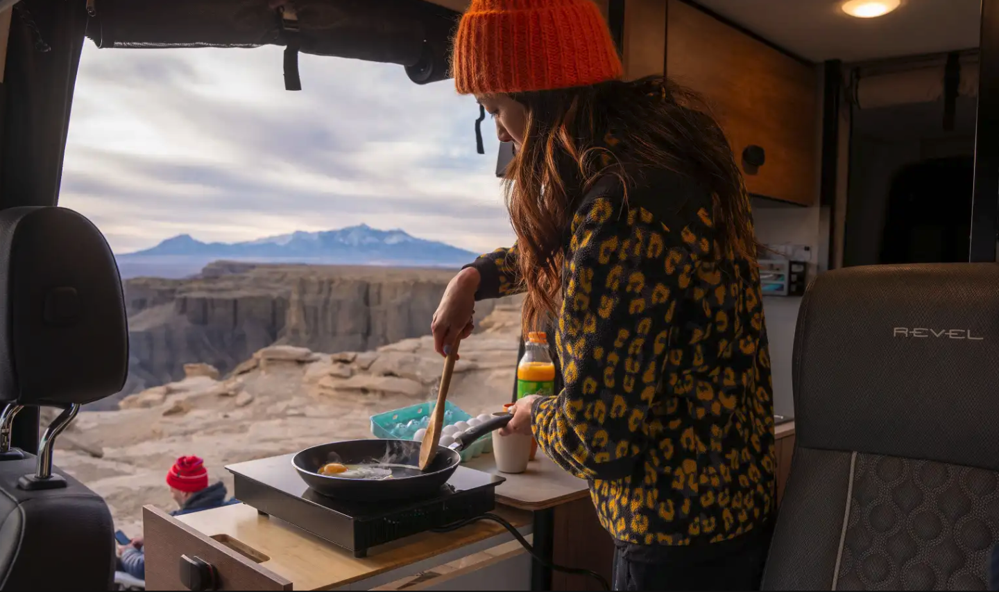 A change to the galley, the new end drawer holds the induction cooker for easier outdoor access and serves as a counter extension