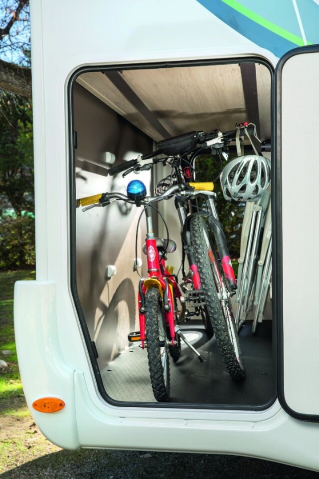 Crank the EasyBox up higher and you can fit bikes and other tall cargo in the pass-through garage