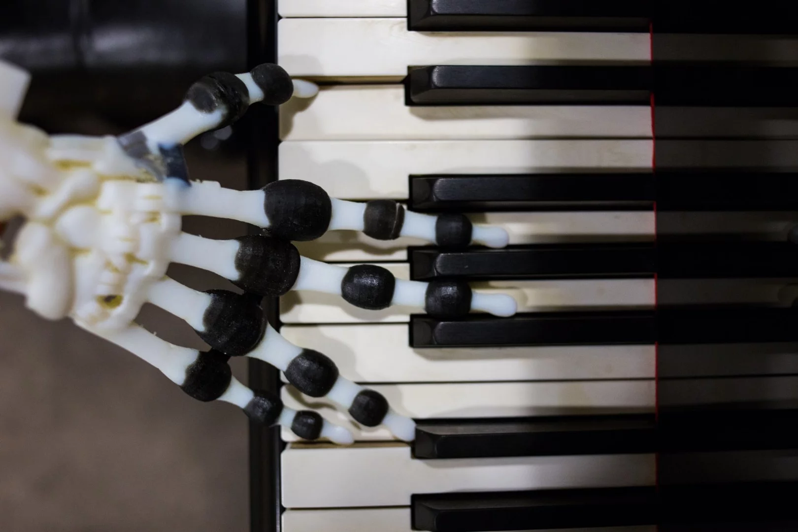 The soft robotic hand isn't going to win any piano playing competitions, but the researchers say that it could lead to the design of robots capable of more natural movement while cutting back on energy use