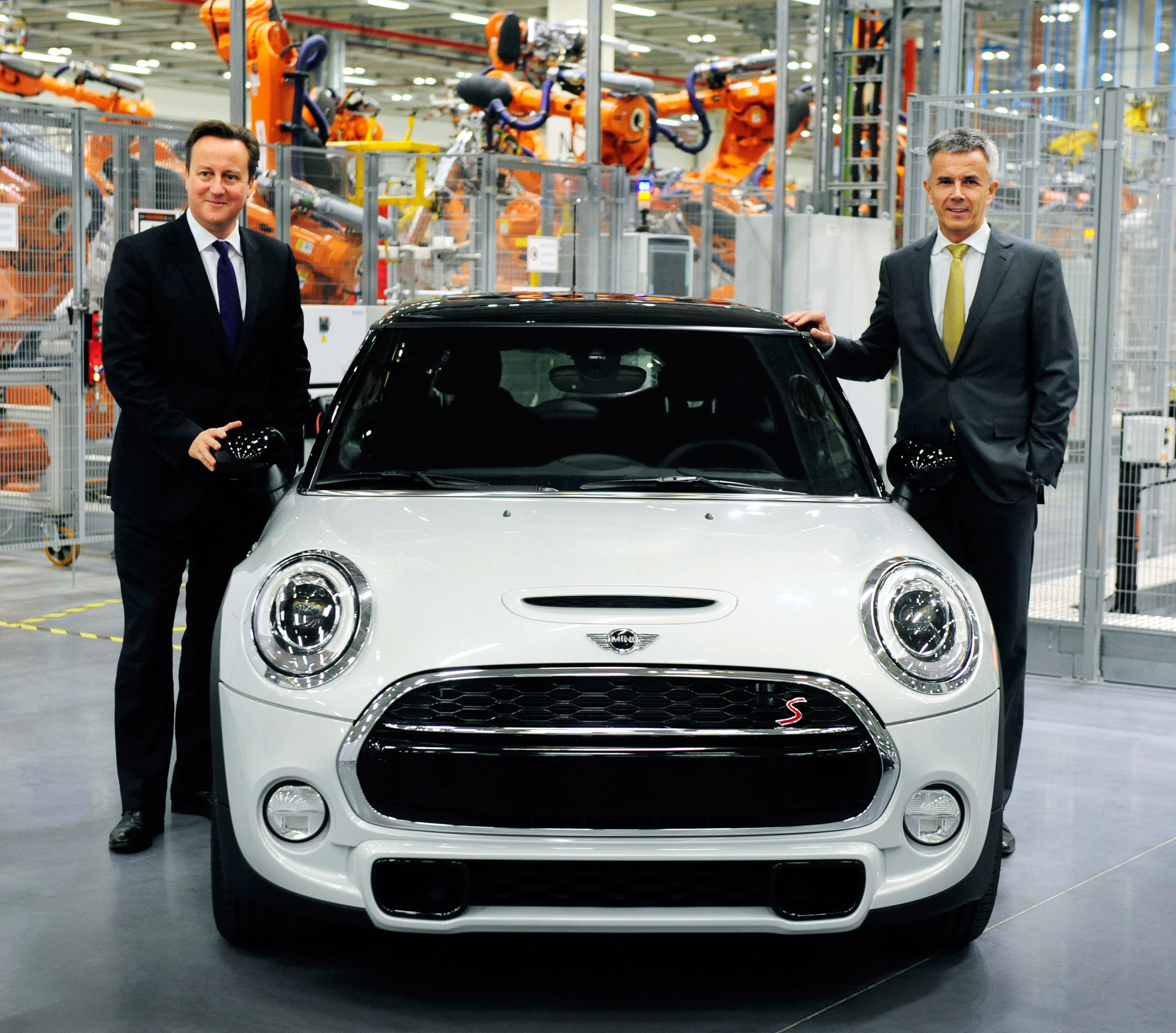 British Prime Minister David Cameronwith Peter Schwarzenbauer, BMW Group's board member for MINI, BMW Motorrad, Rolls-Royce, Aftersales BMW Group