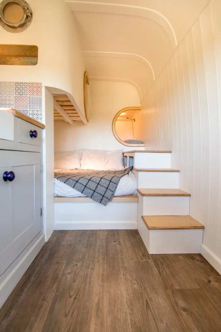 The van features gorgeous wooden floors