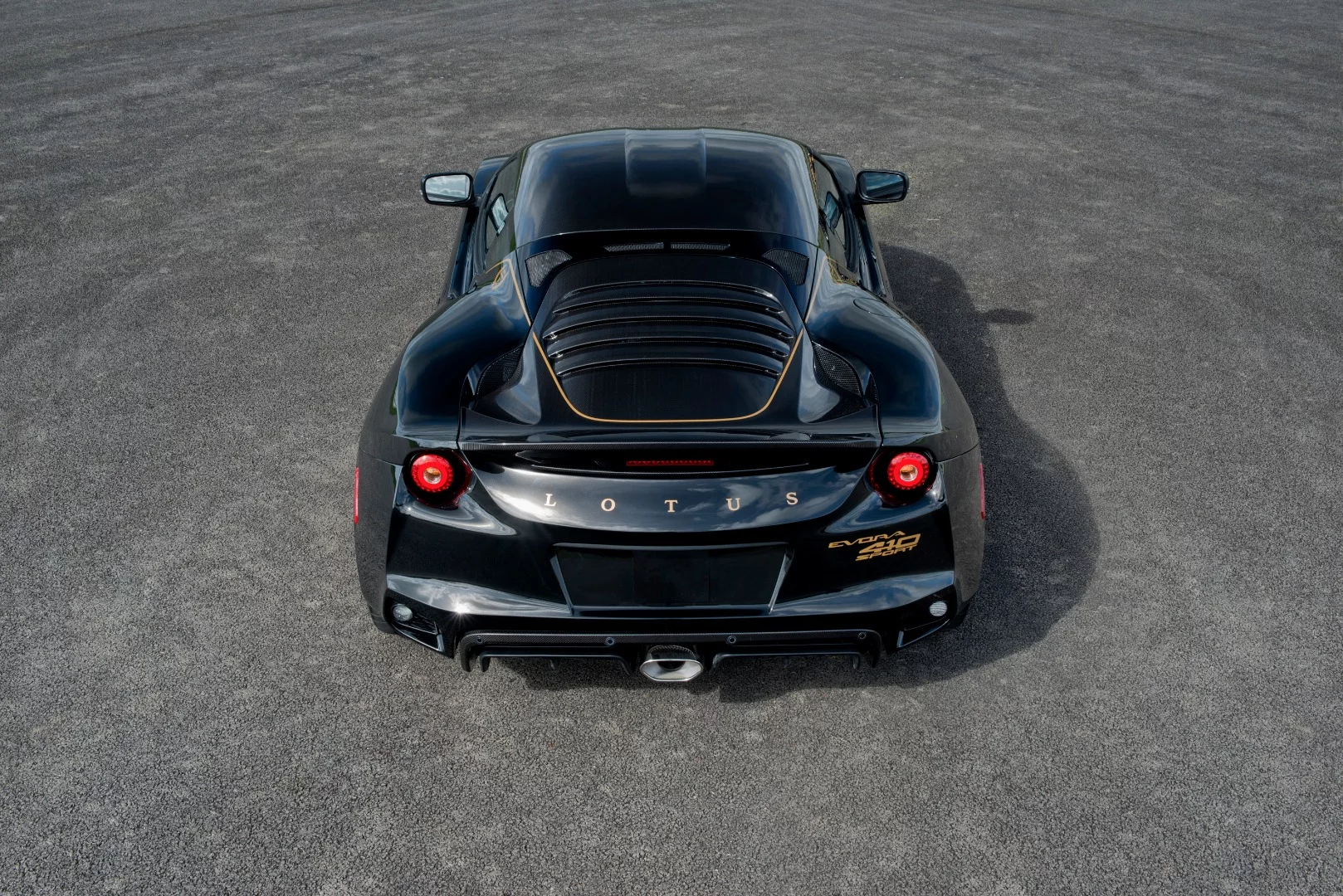 The Evora Sport 410 breathes through a titanium exhaust