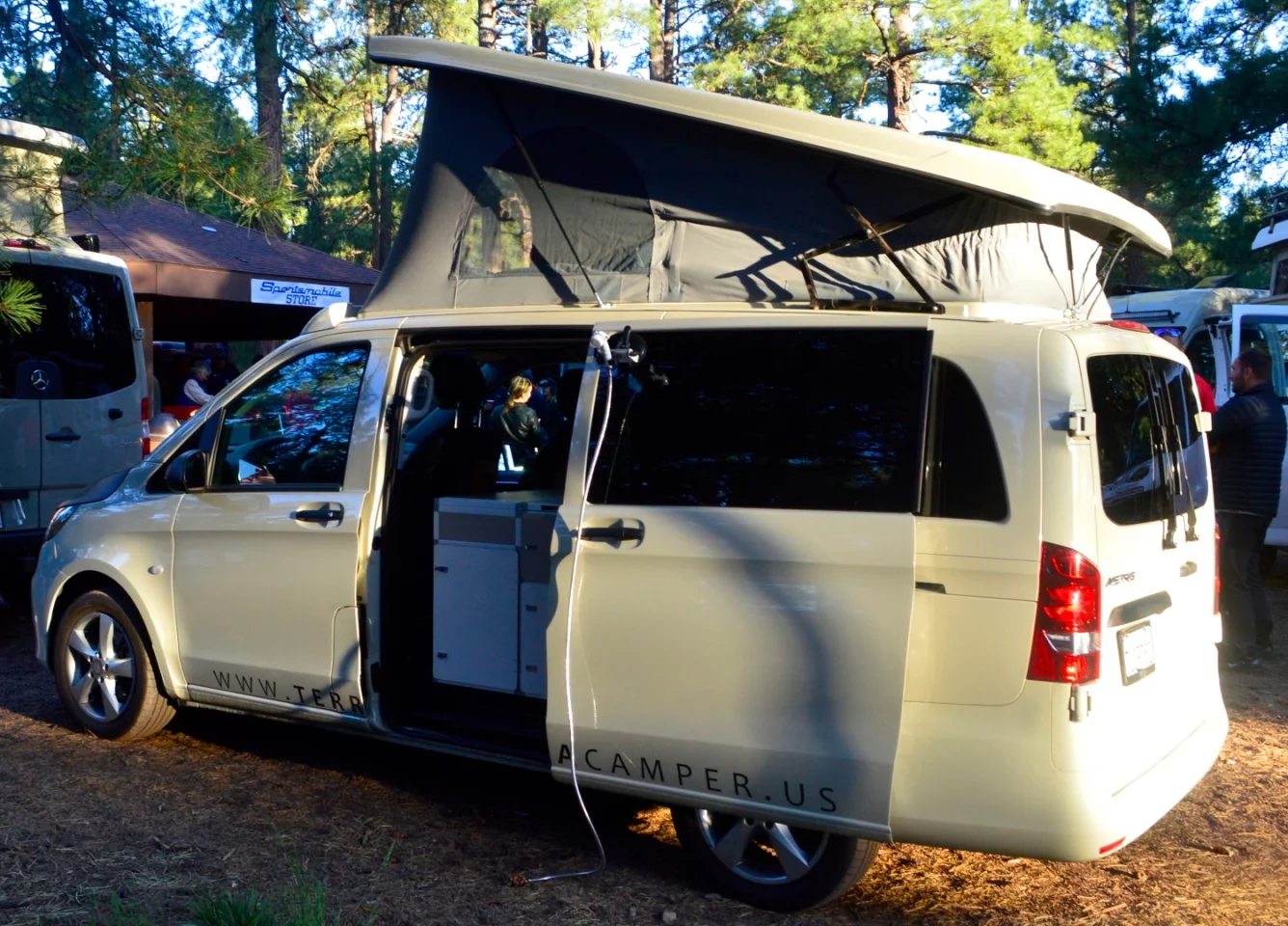 The Terracamper Metris package includes a pop-up roof with bed