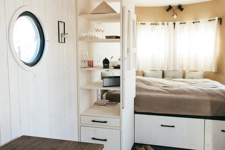 Shelving provides additional storage space in the Wohnwagon