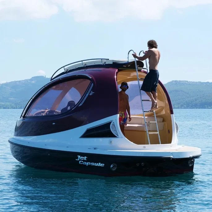 A rear ladder provides easy access to the rooftop, complete with a sunbed lounge