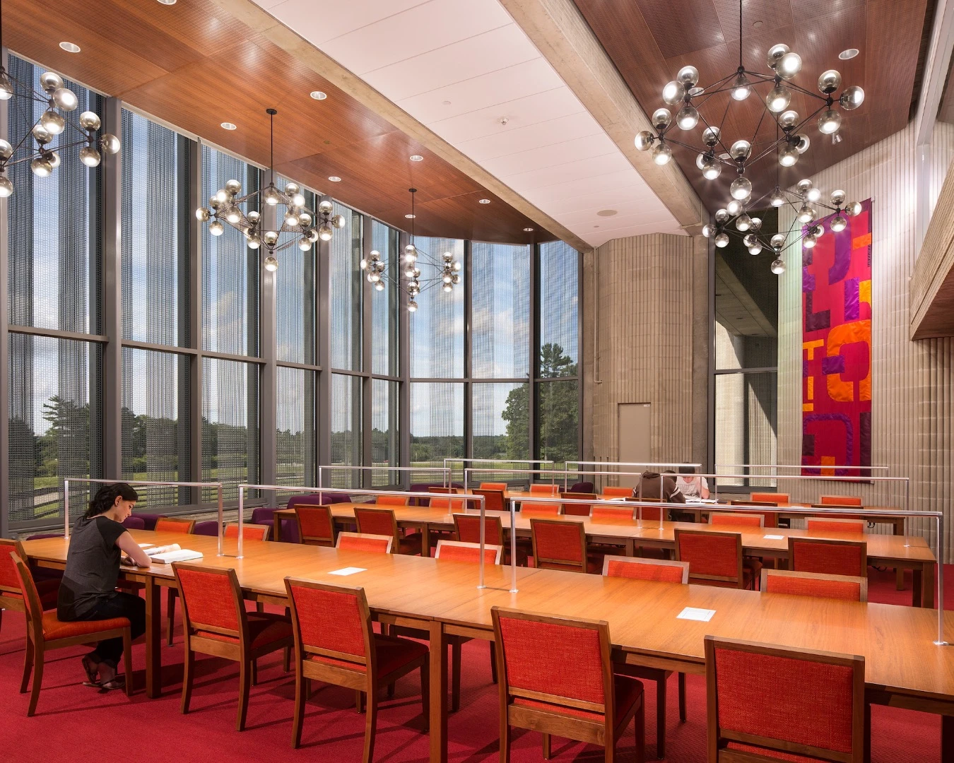 The University of Massachusetts Dartmouth, Claire T. Carney Library, by designLAB architects, involved the renovation and modernization of a Brutalist university building