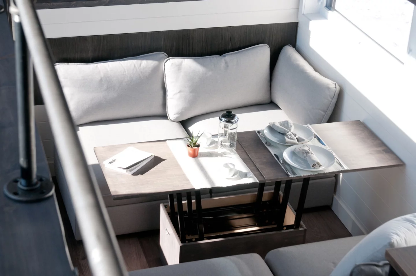 Top-down view of the Sakura's main living area, showing raised coffee table