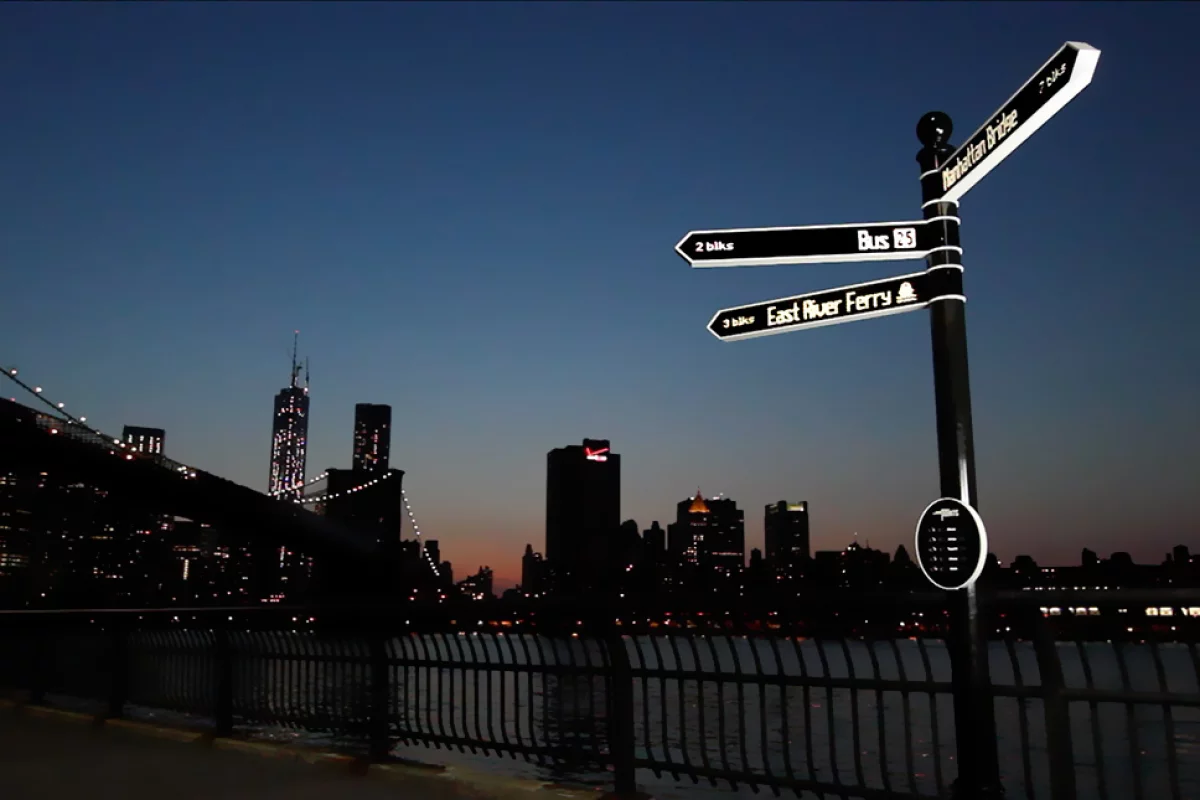 Points is an internet-connected street sign that pulls data from social media and spins 360 degrees to aim in the direction of any location or event