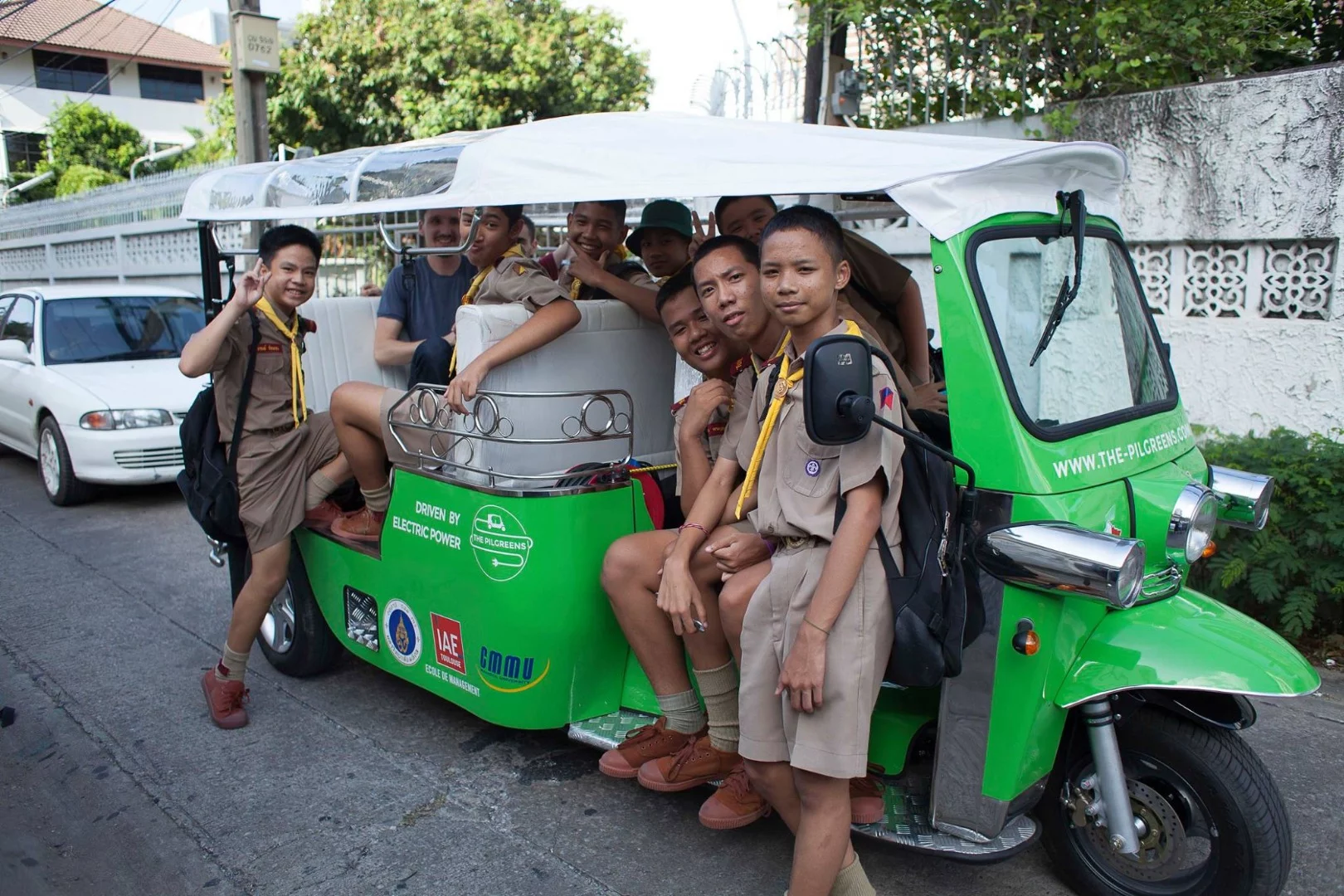 In its free time in Bangkok the green tuk-tuk occasionally doubled as a free school shuttle service