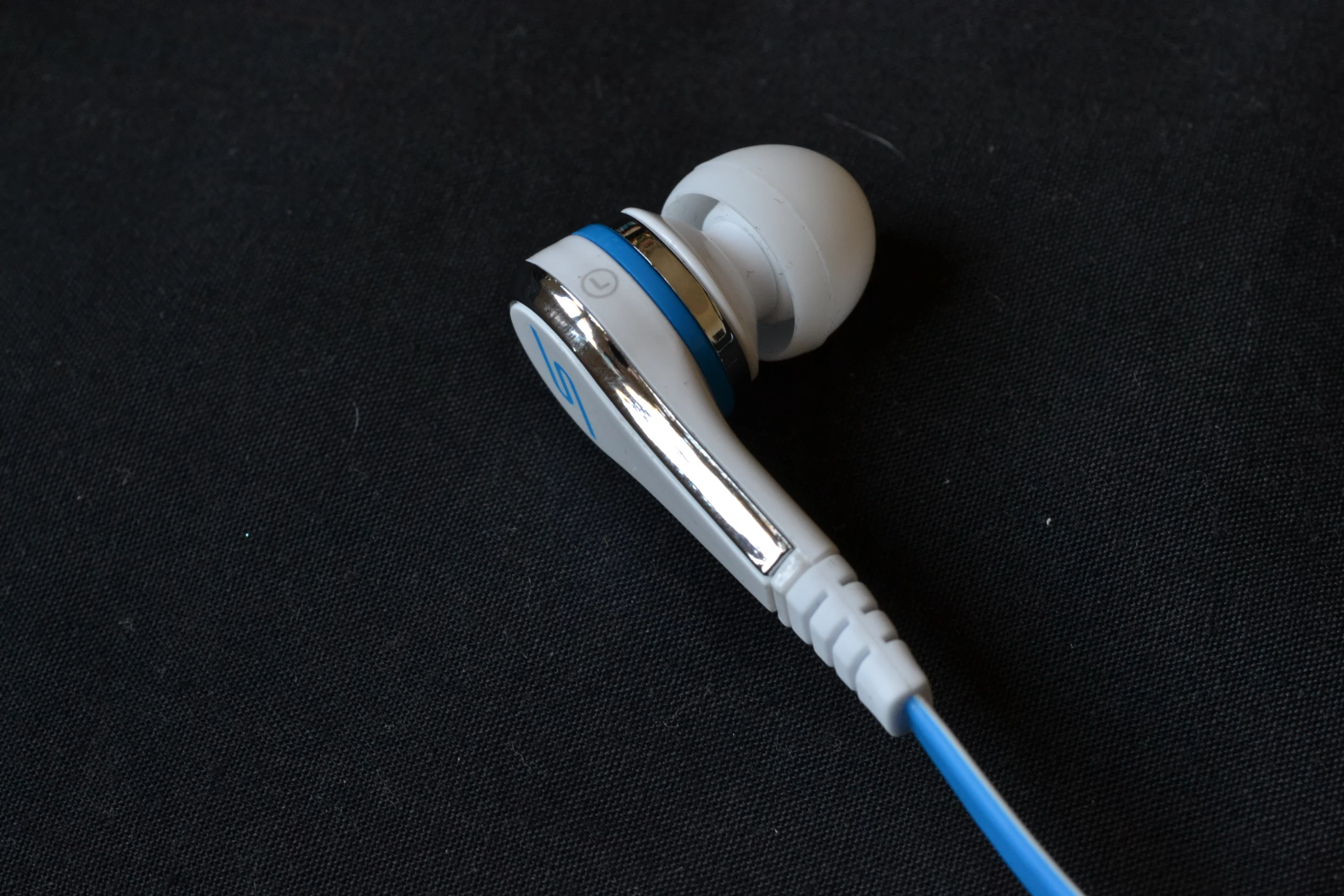 Of mostly ABS plastic construction and sharing design elements with their bigger brothers, the pure white is complemented by shiny chrome/silver finish that's tastefully interrupted with blue