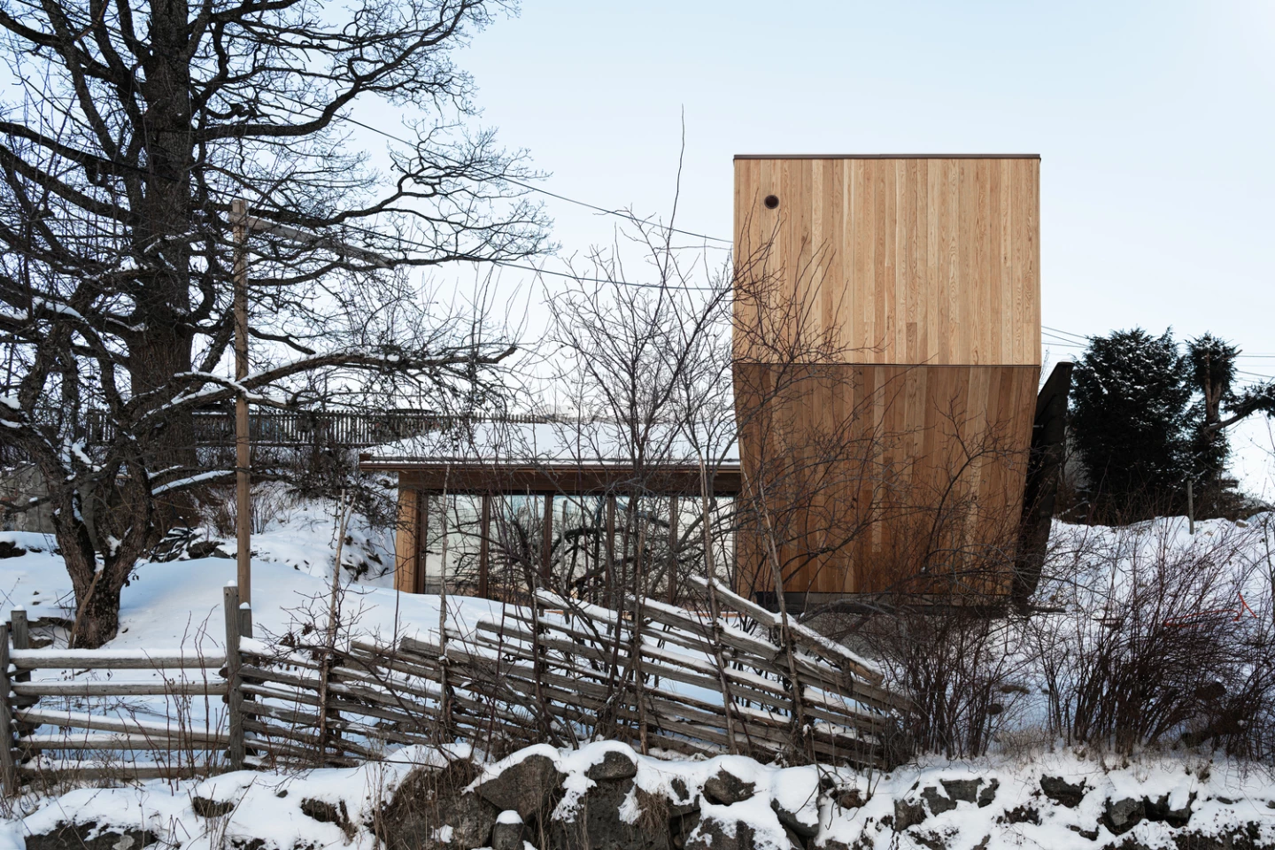 The folly marks a serene gateway between busy life and pastoral calm