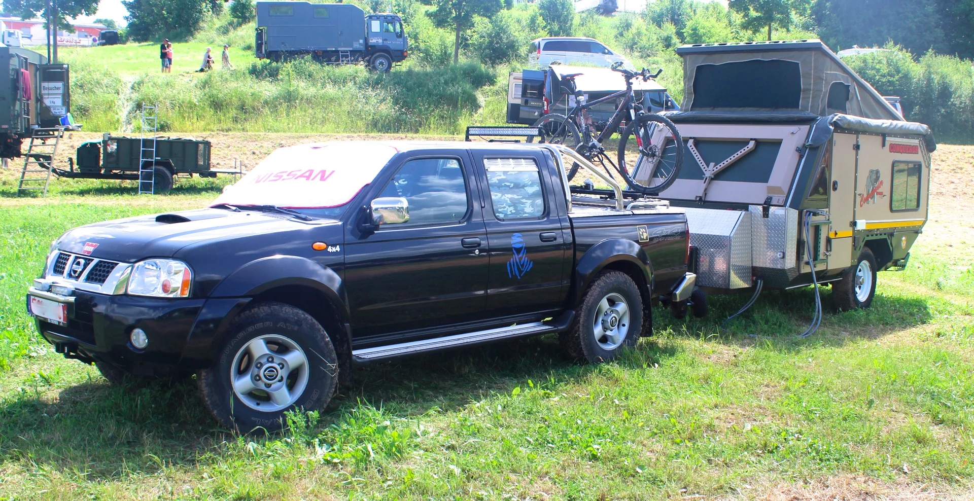Nissan pickup towing a rugged off-road trailer from South Africa's Conqueror
