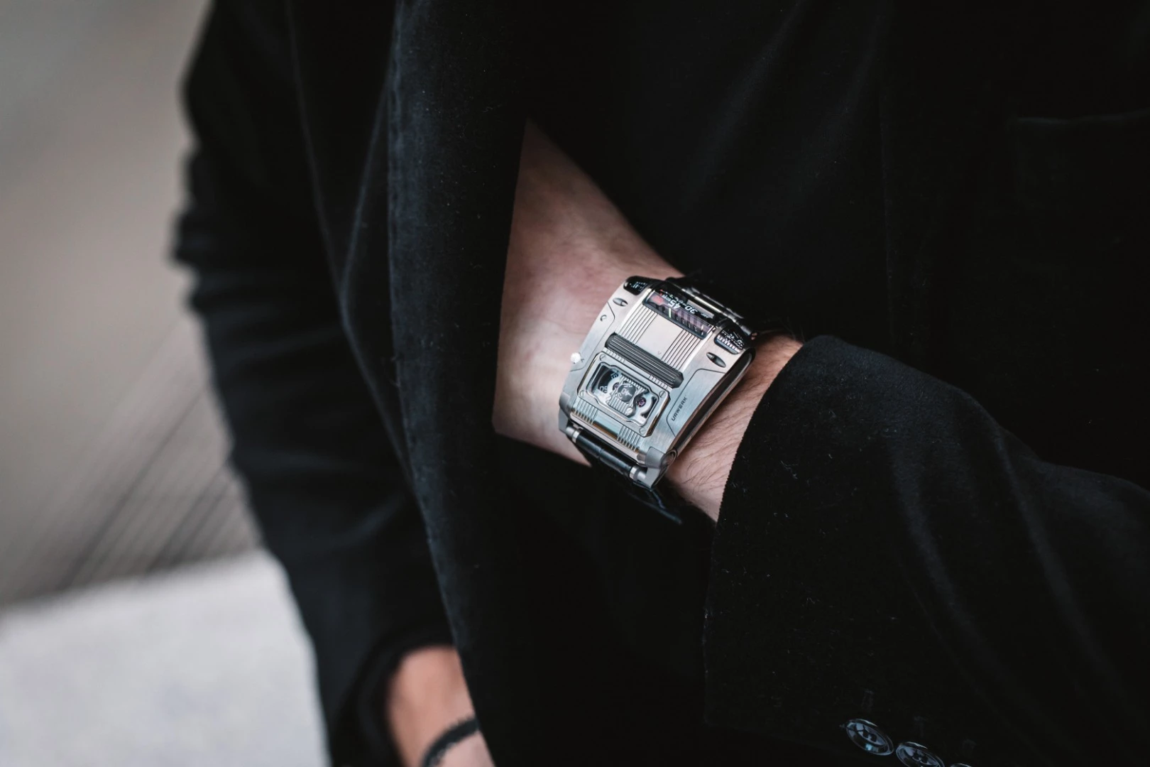 The Urwerk UR111C is set using a lever action
