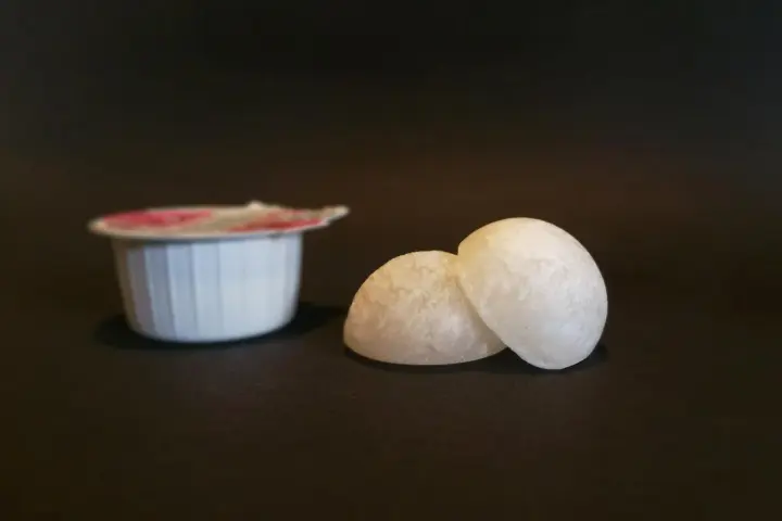 Some of the capsules, as compared to a disposable coffee cream packet