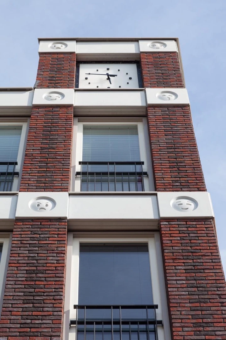 The inspiration for the idea came from the House with the Heads, which lies nearby the firm's office