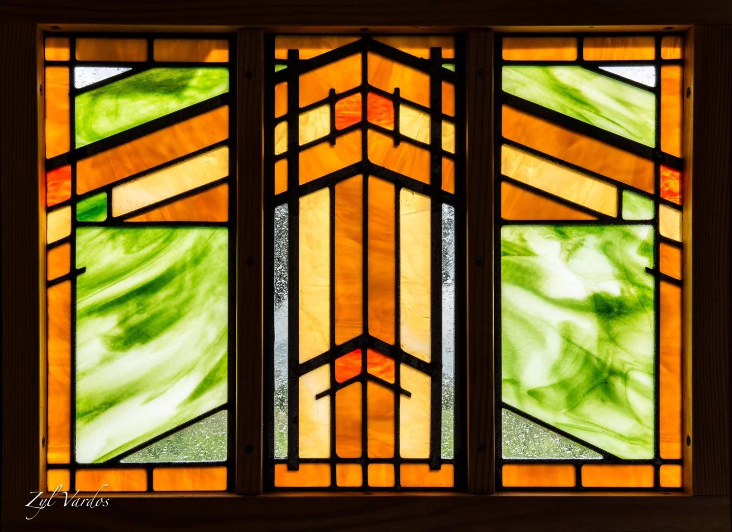 Closeup shot of the stained glass in Fuchsia 's door