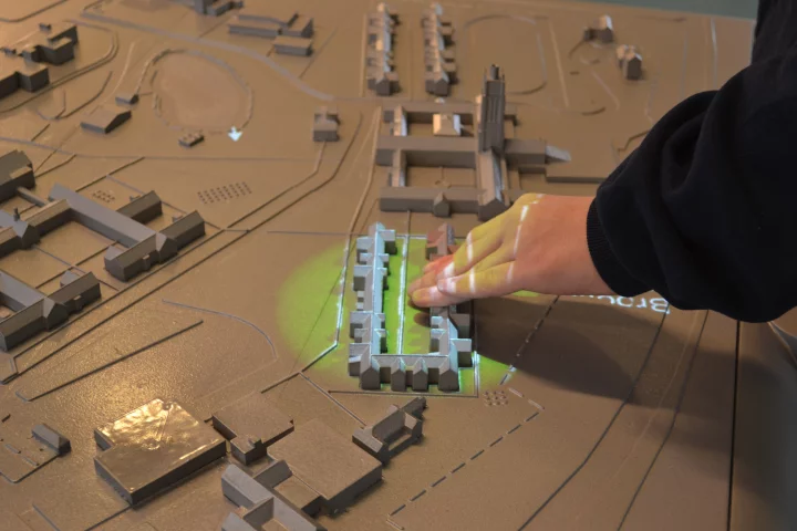 Multi-sensory 3D maps give spoken directions and building information when touched, along with sound effects and overhead video projection related to a particular place (Photo: University of Buffalo IDeA Center)