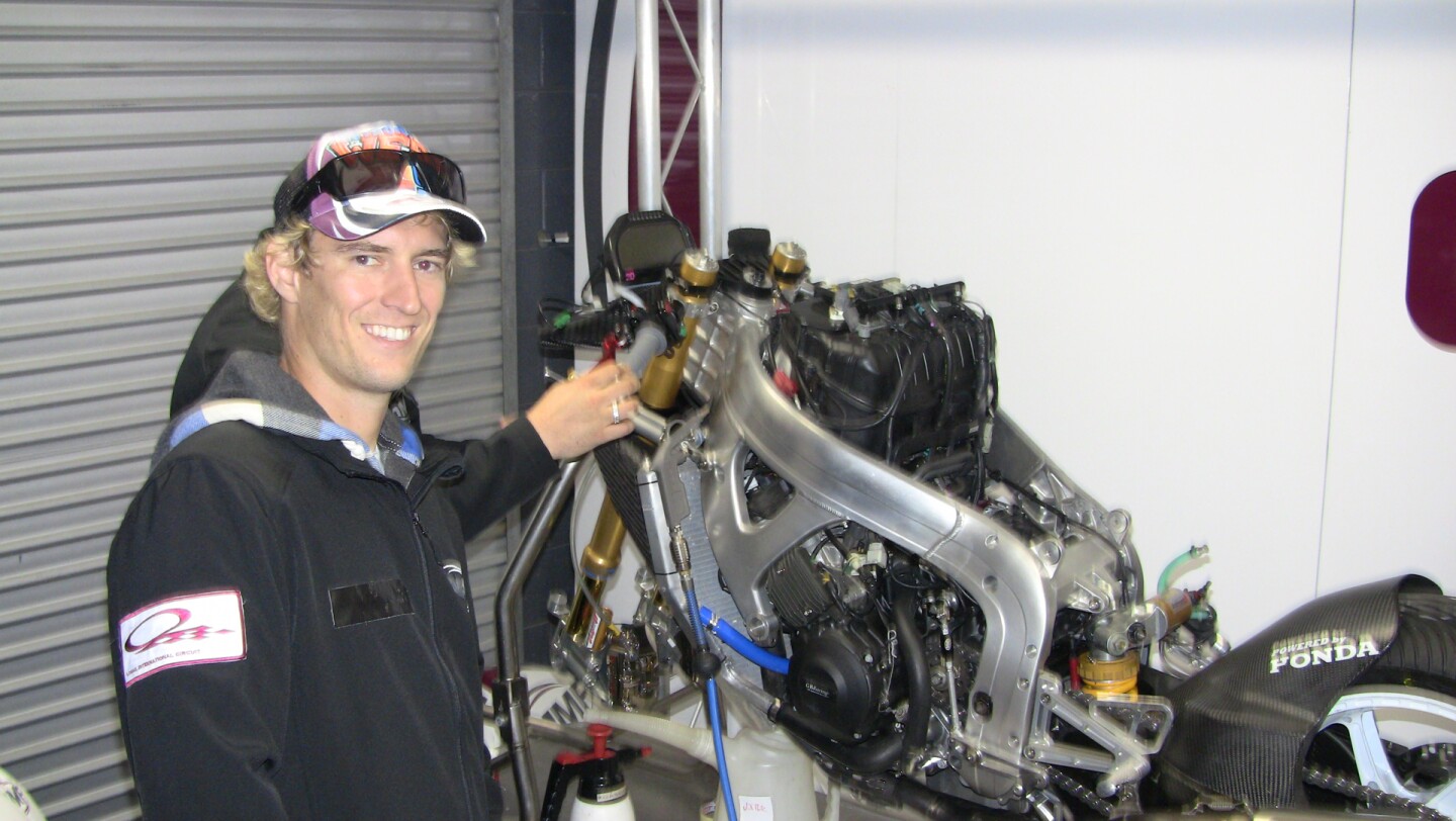 Ant West with his stripped down Moto2 bike