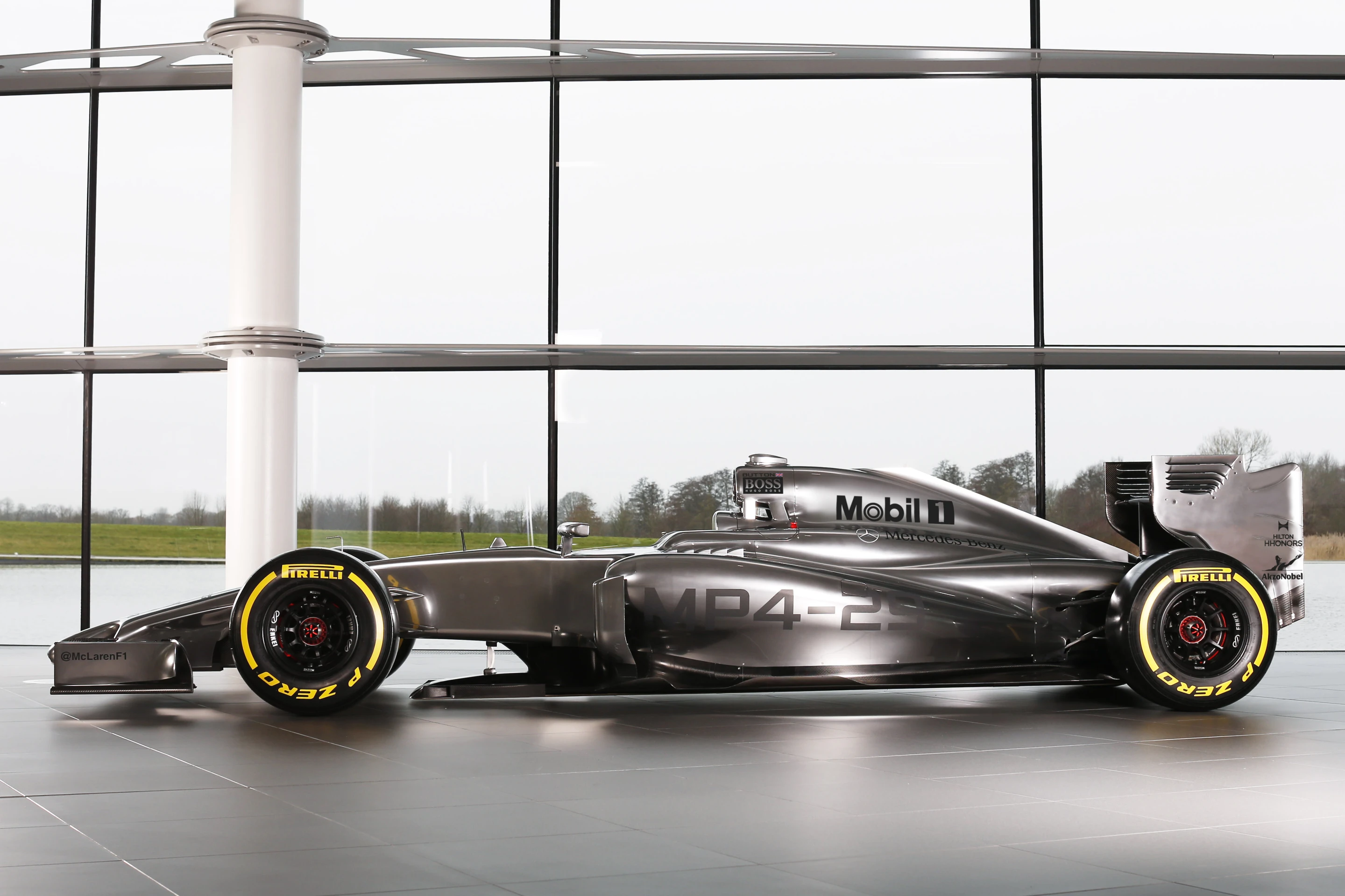 So exhaust gases can't affect aerodynamics, new regulations state the car's exhaust must exit upwards on the car’s centerline, near the rear light, with no bodywork behind the tailpipe